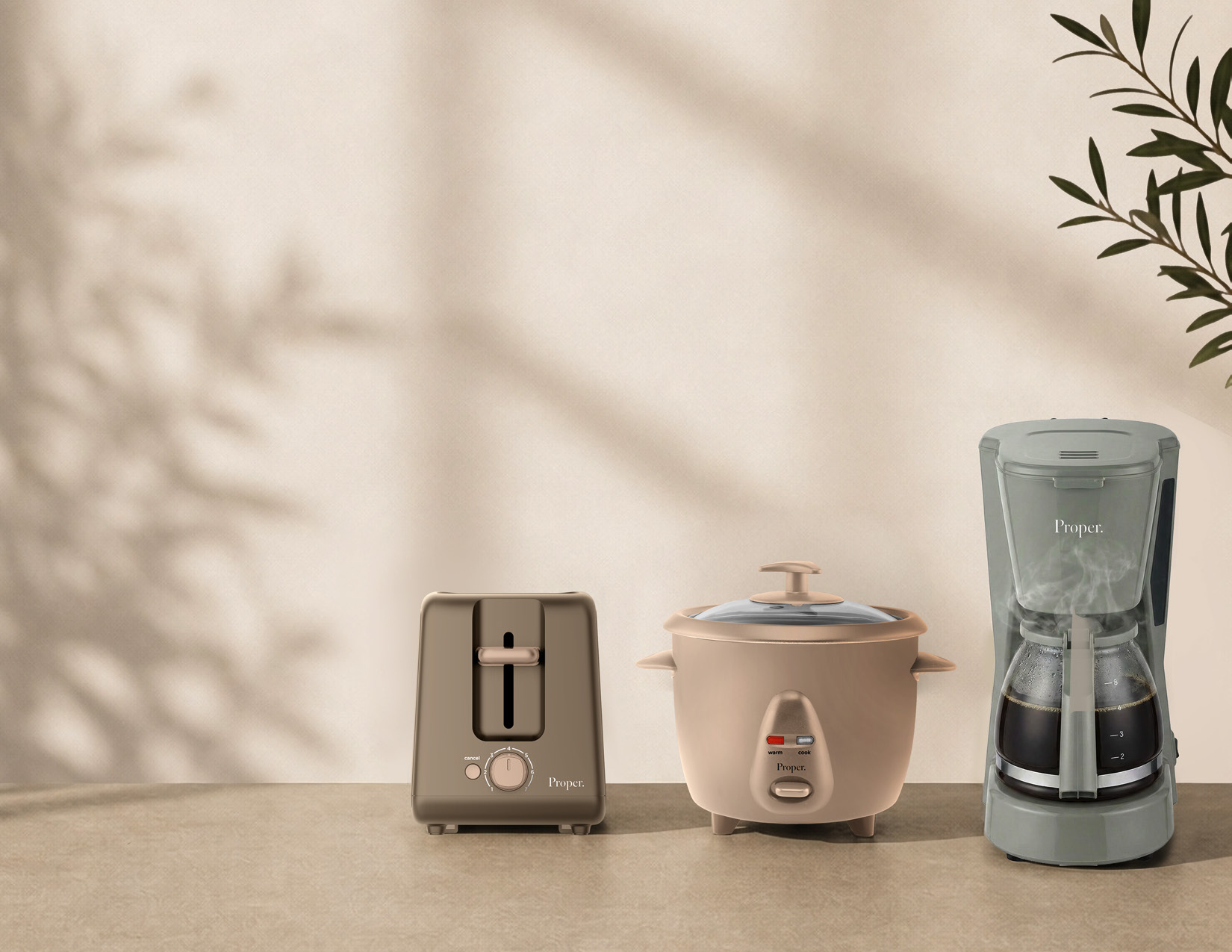 A coordinated cluster of Proper toaster, rice cooker, and coffee maker